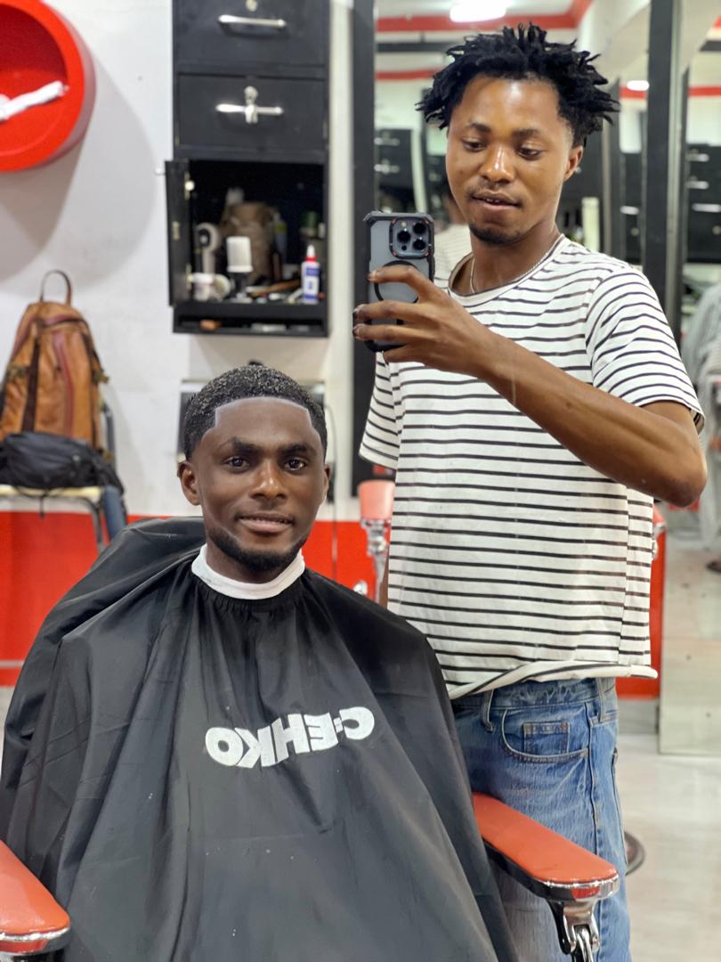 Client showing completed low fade and clean look